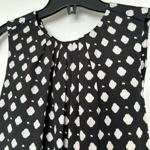 Black and cream dress with pockets